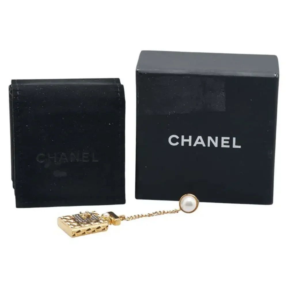 CHANEL Gold Pearl Logo Earrings